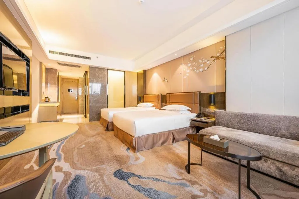 Bed in Licai Tianqi Hotel