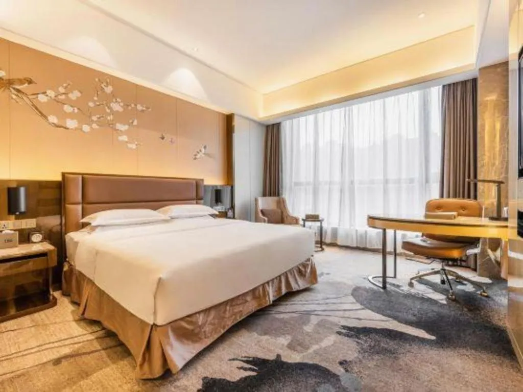 Bed in Licai Tianqi Hotel