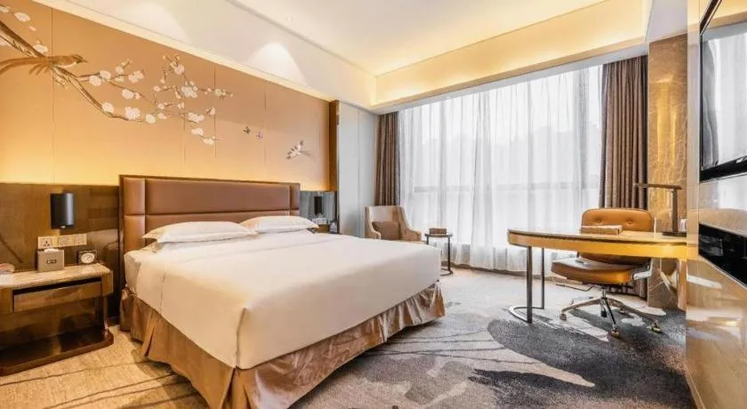 Bed in Licai Tianqi Hotel