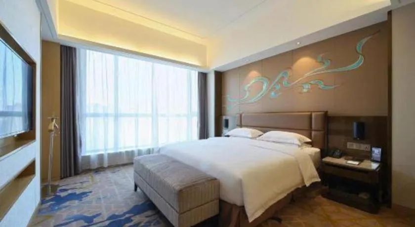 Bed in Licai Tianqi Hotel