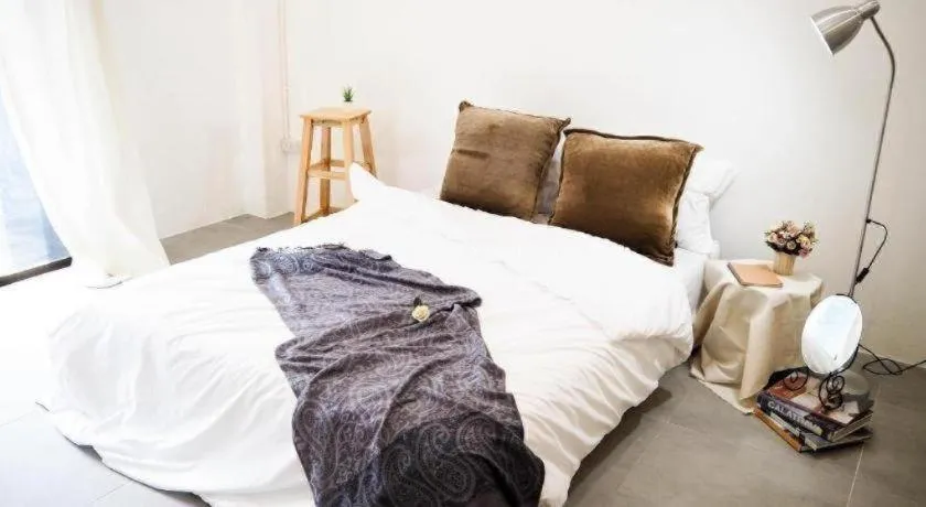 Bed in Unyak Room Ayutthaya