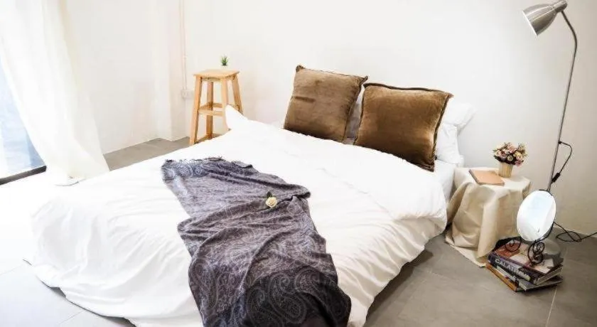 Bed in Unyak Room Ayutthaya