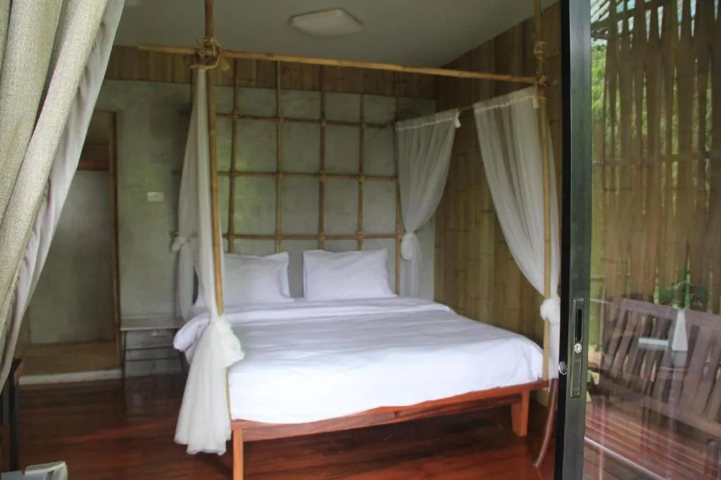 Bed in Le Bassin Erawan Resort