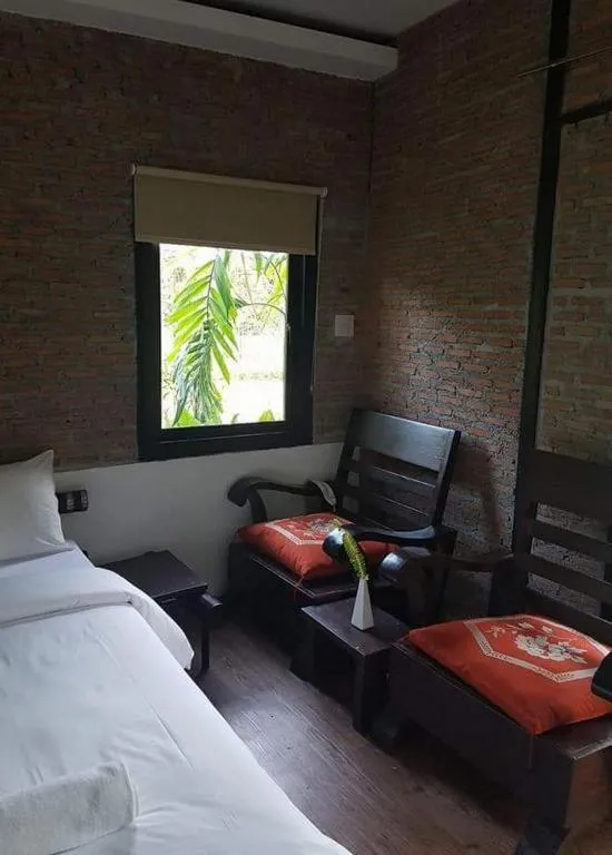 Bed in Le Bassin Erawan Resort