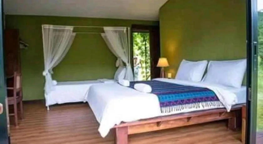 Bed in Le Bassin Erawan Resort