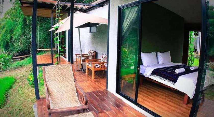 Bed in Le Bassin Erawan Resort