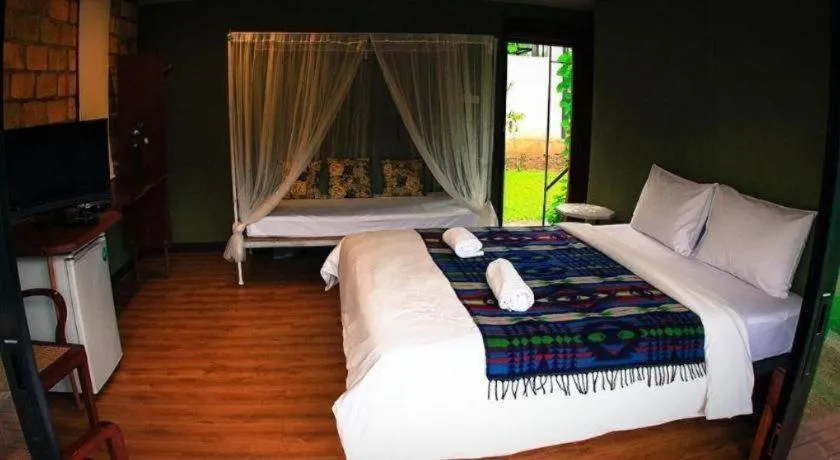 Bed in Le Bassin Erawan Resort