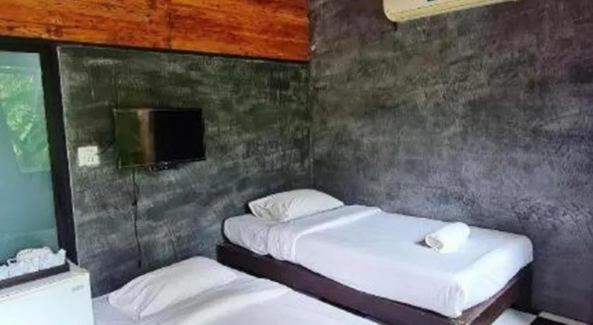 Bed in Le Bassin Erawan Resort