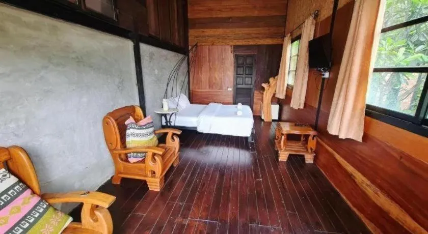 Bed in Le Bassin Erawan Resort