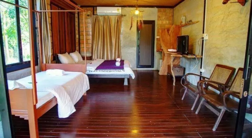 Bed in Le Bassin Erawan Resort