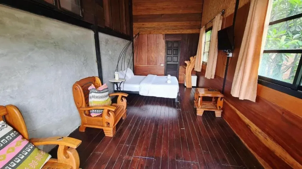 Bed in Le Bassin Erawan Resort