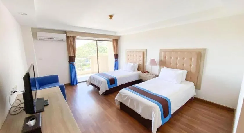 Bed in Blue Wave Hotel Hua Hin
