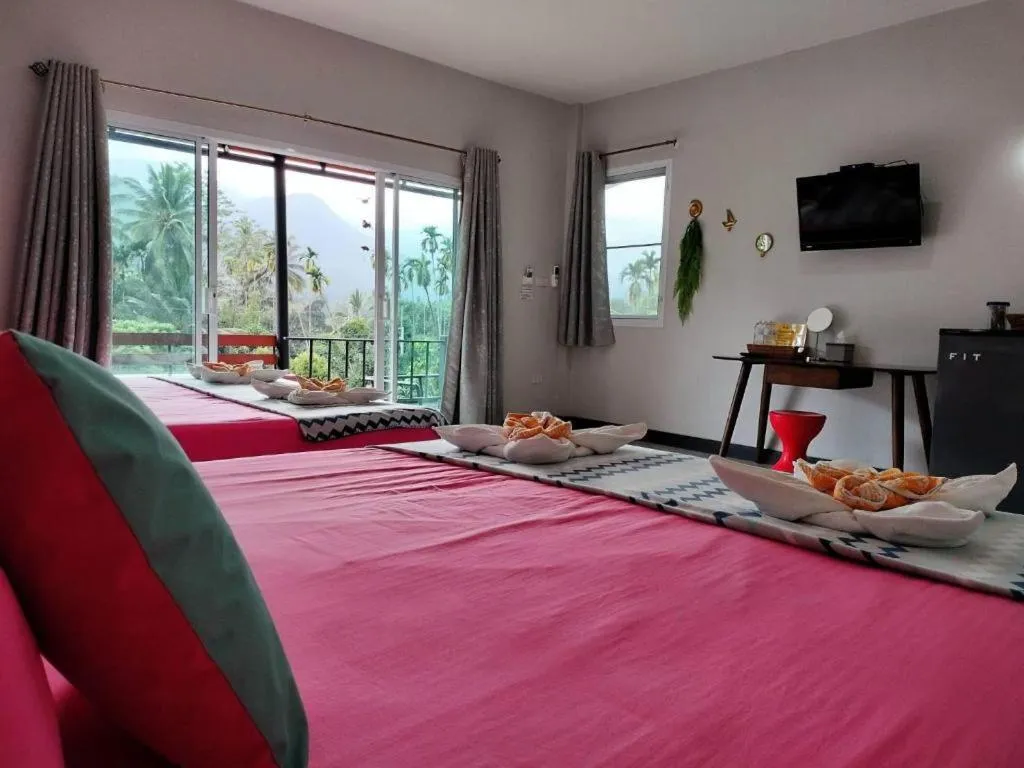 Bed in Baan Bhuriwat Kiriwong