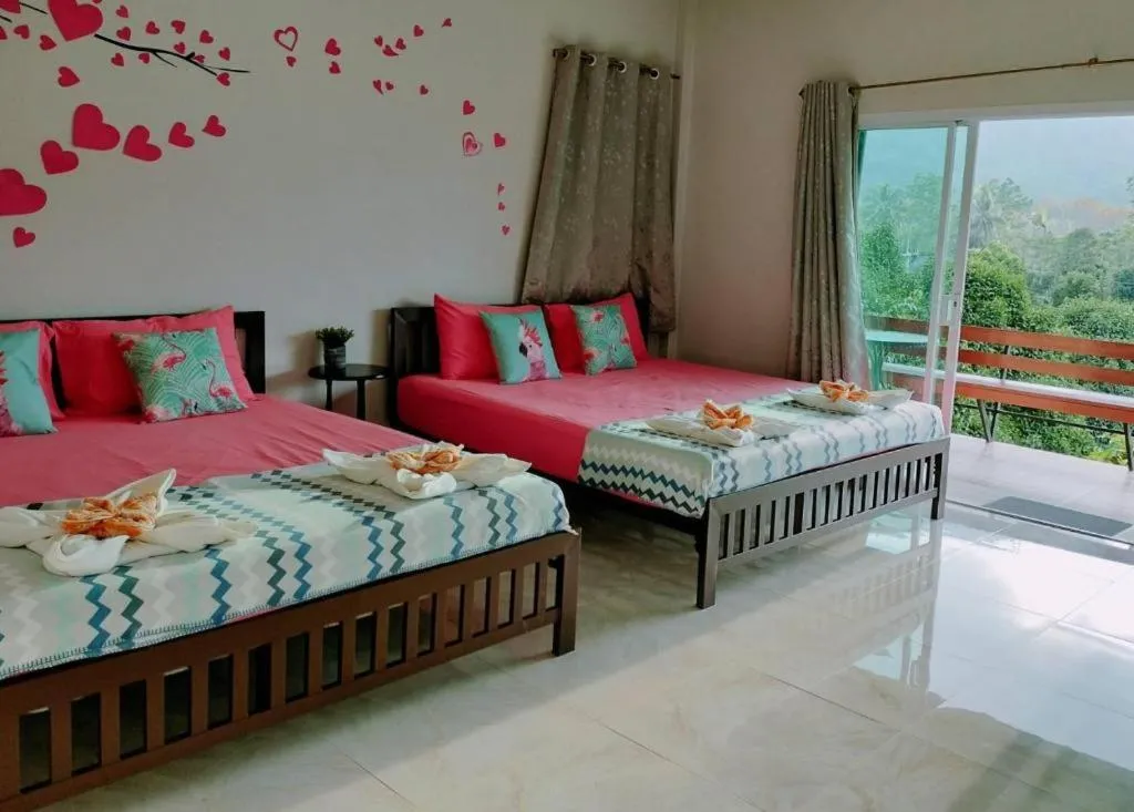 Bed in Baan Bhuriwat Kiriwong