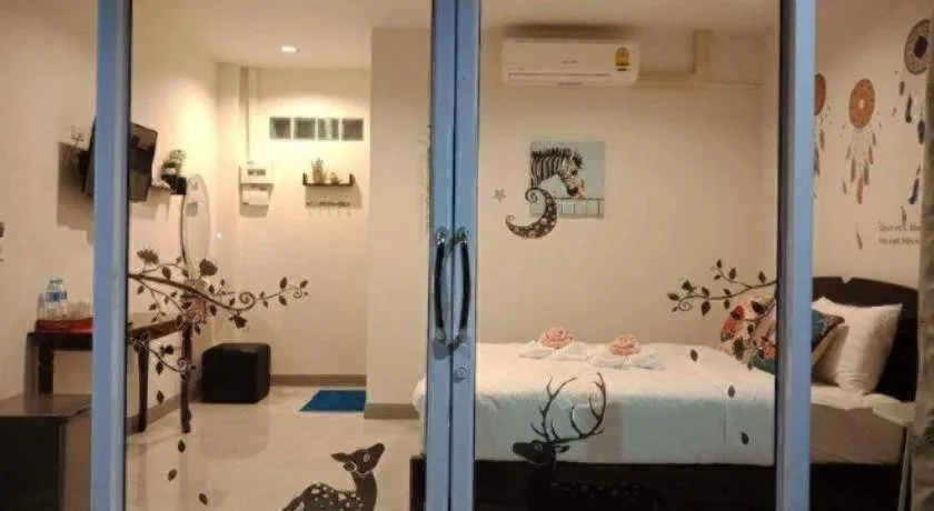 Bed in Baan Bhuriwat Kiriwong