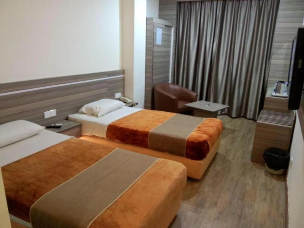 Bed in Holiday Hotel Batam