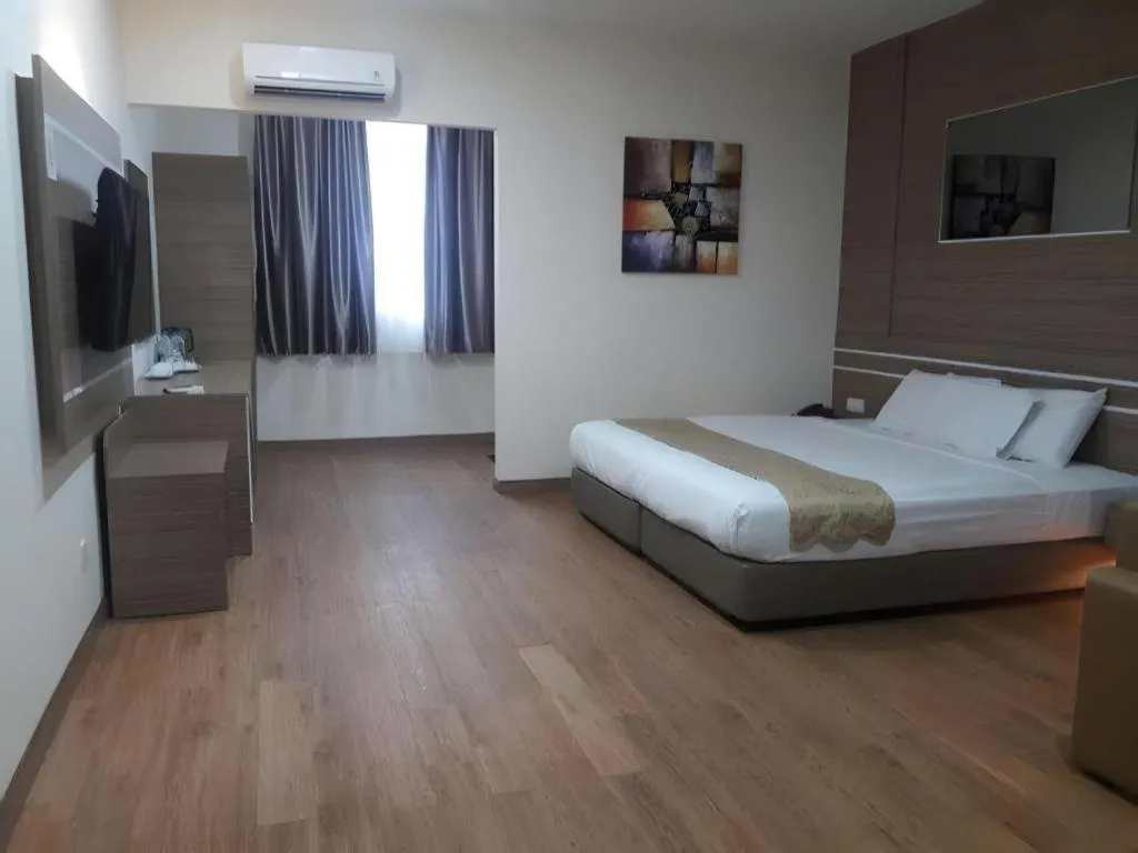 Bed in Holiday Hotel Batam