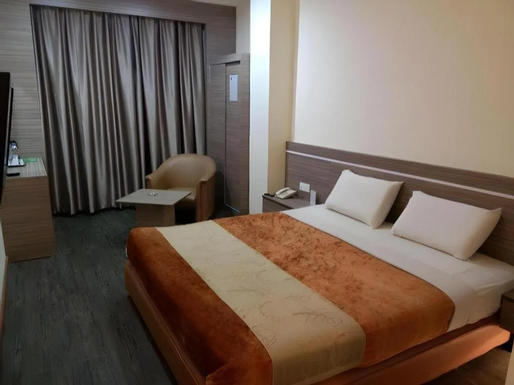 Bed in Holiday Hotel Batam