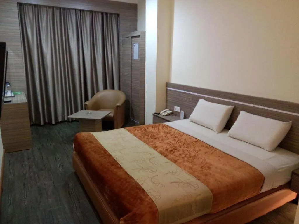 Bed in Holiday Hotel Batam