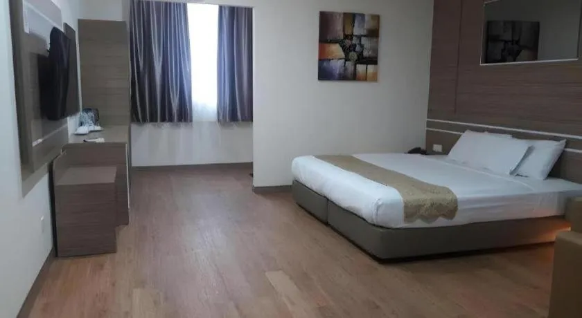 Bed in Holiday Hotel Batam