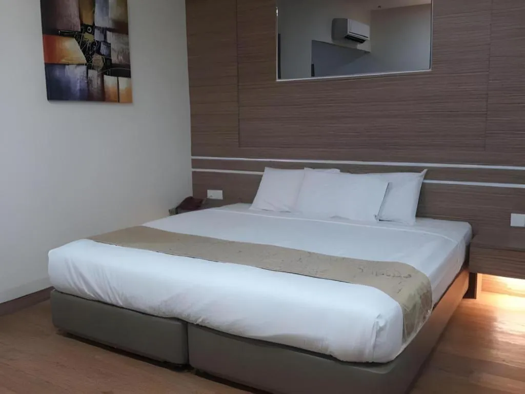 Bed in Holiday Hotel Batam