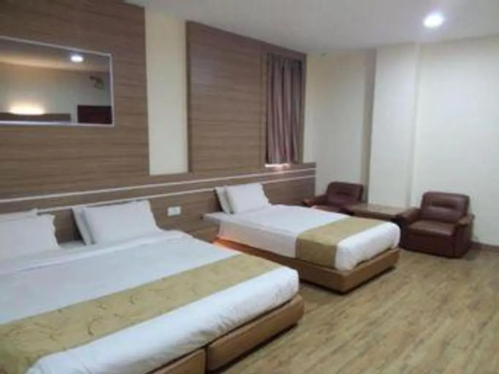 Bed in Holiday Hotel Batam