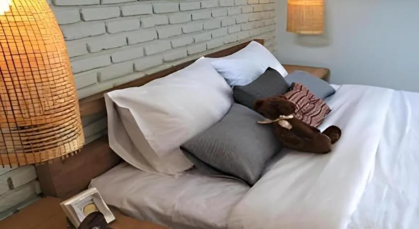 Bed in Yellow Moon Hotel