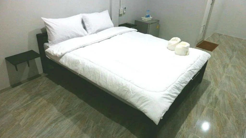 Bed in Narisara Korat Resort