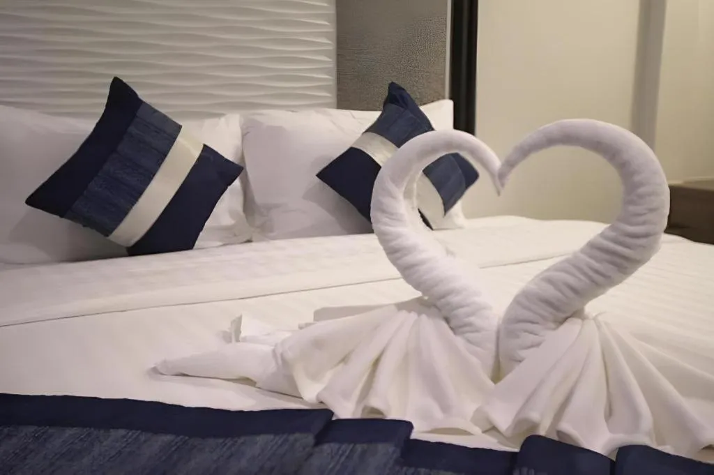 Bed in Chatnipa Beach Resort