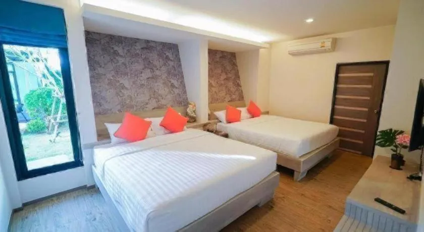 Bed in Chatnipa Beach Resort