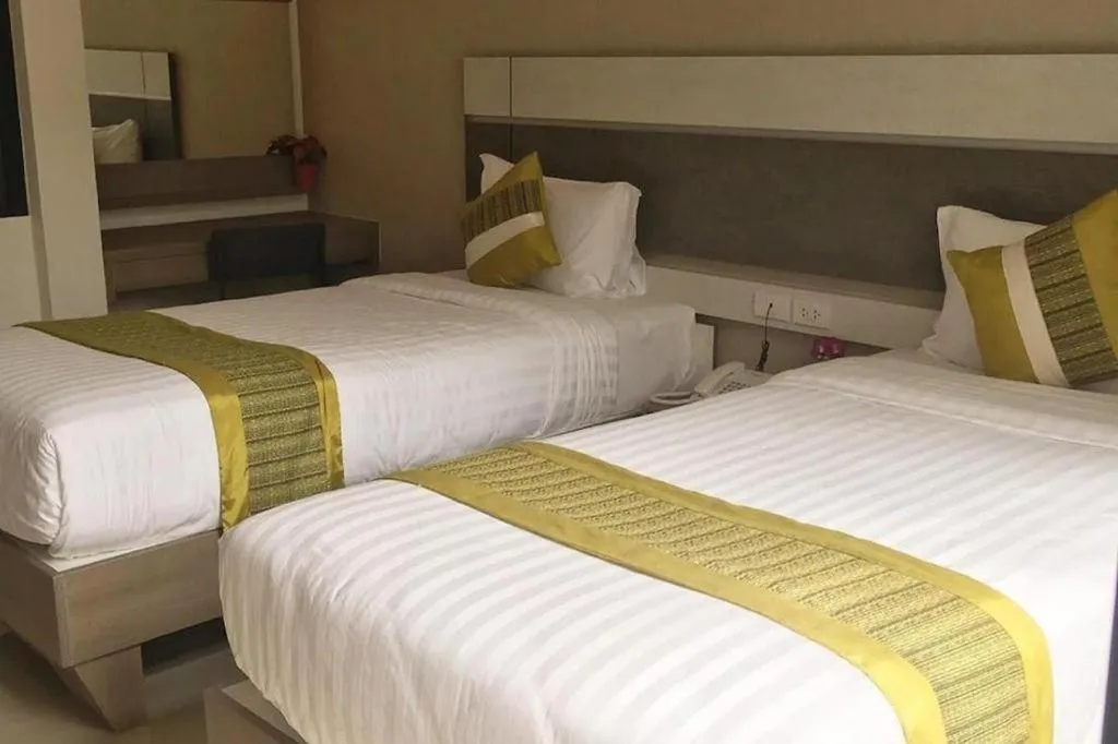 Bed in Chatnipa Beach Resort