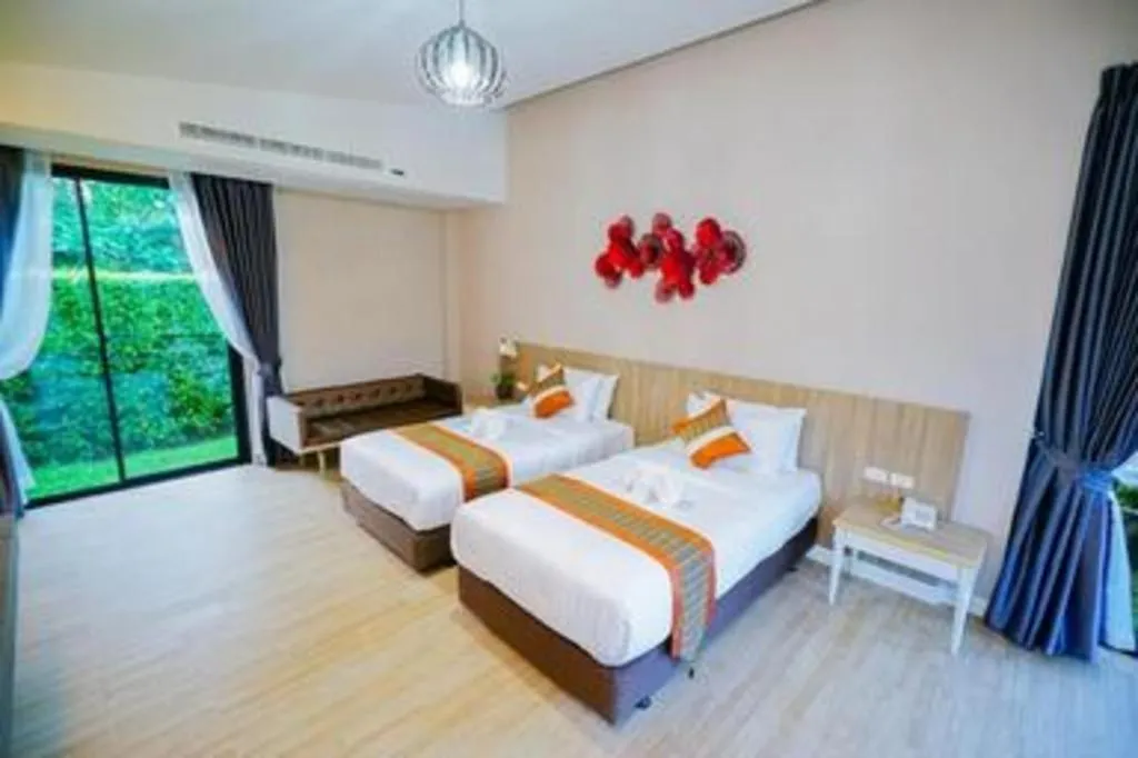 Bed in Chatnipa Beach Resort