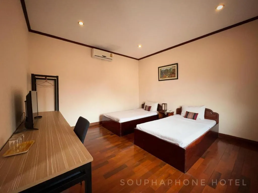 Bed in Souphaphone Hotel