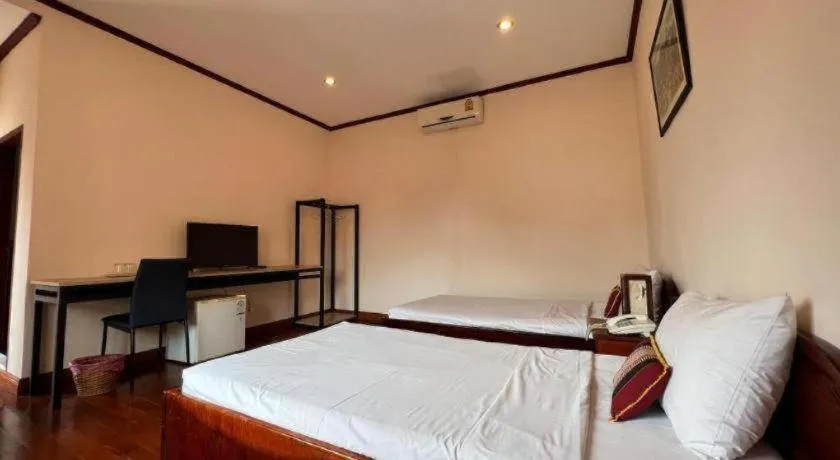 Bed in Souphaphone Hotel