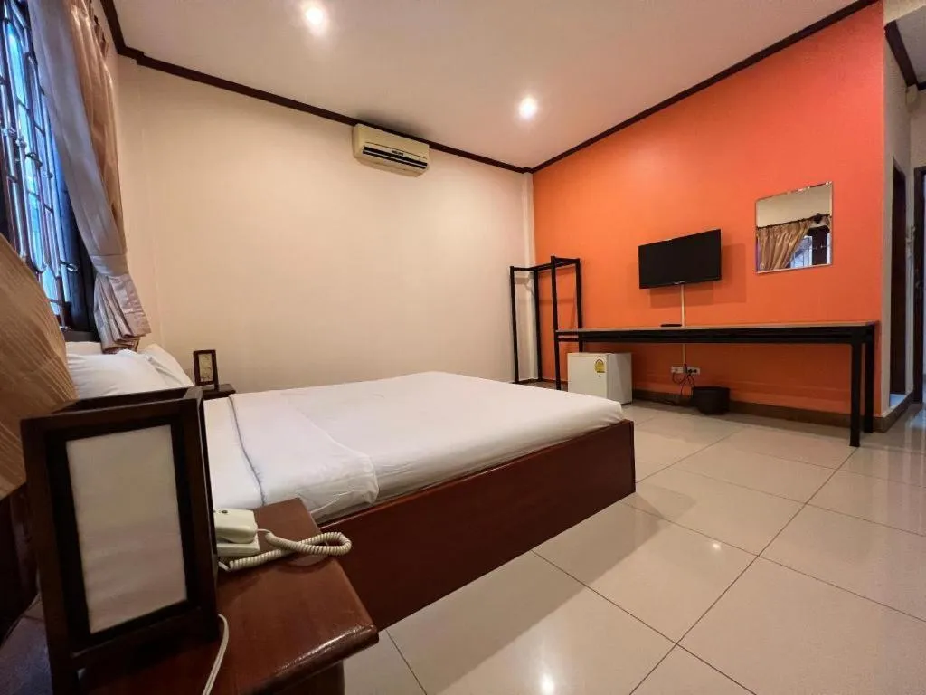 Bed in Souphaphone Hotel