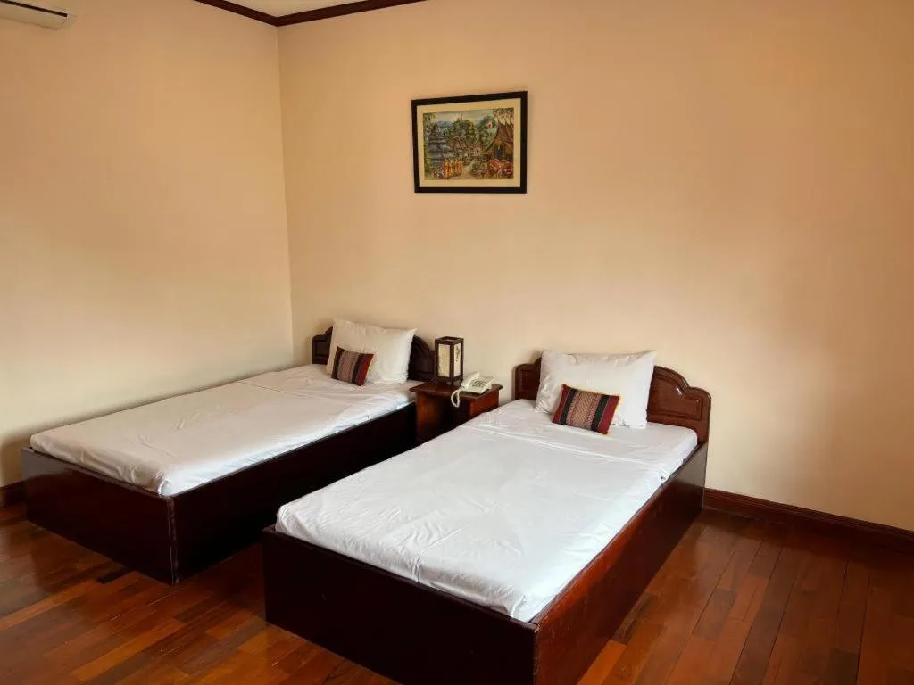 Bed in Souphaphone Hotel