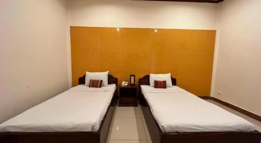 Bed in Souphaphone Hotel