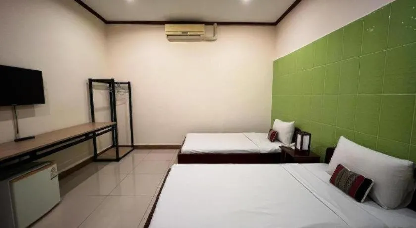 Bed in Souphaphone Hotel