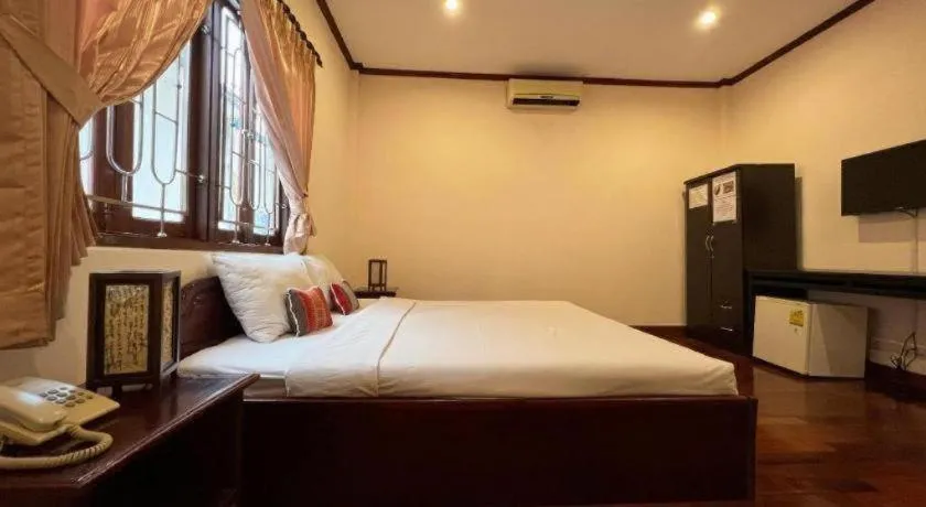 Bed in Souphaphone Hotel