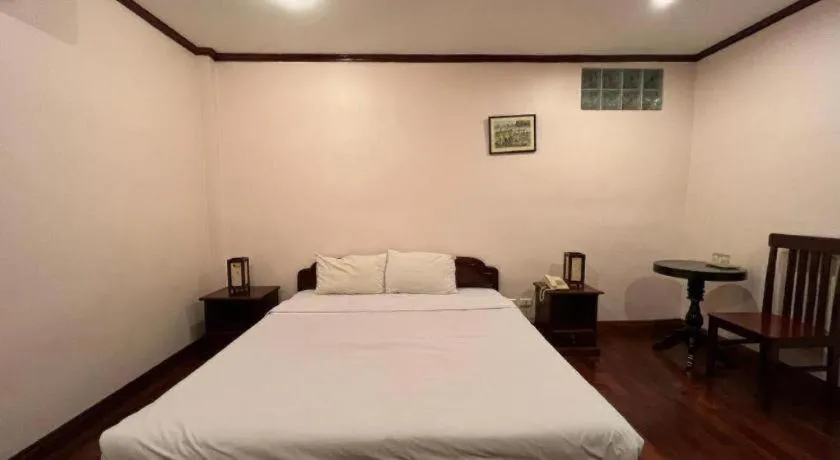 Bed in Souphaphone Hotel