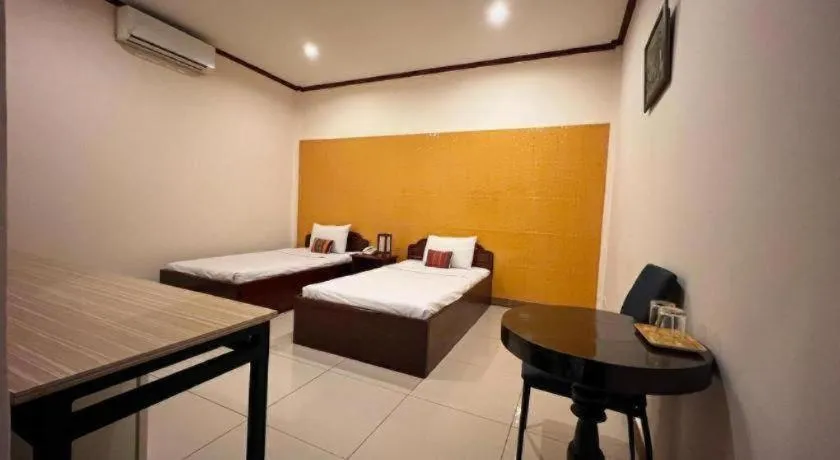 Bed in Souphaphone Hotel