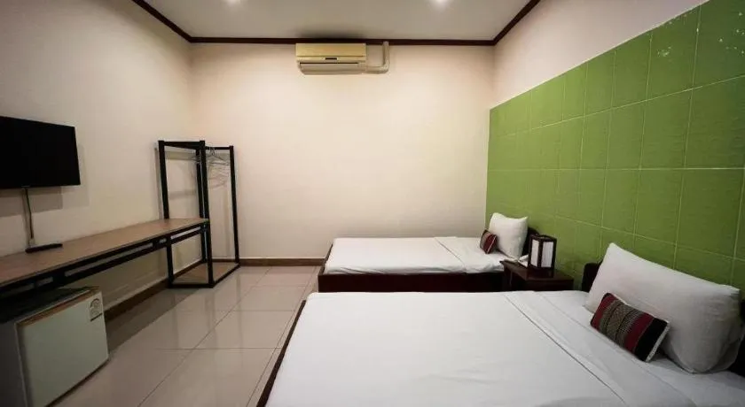 Bed in Souphaphone Hotel