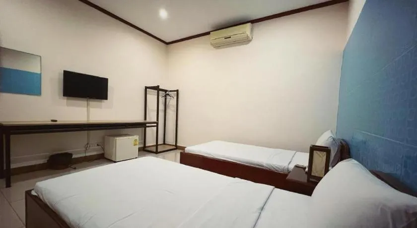 Bed in Souphaphone Hotel