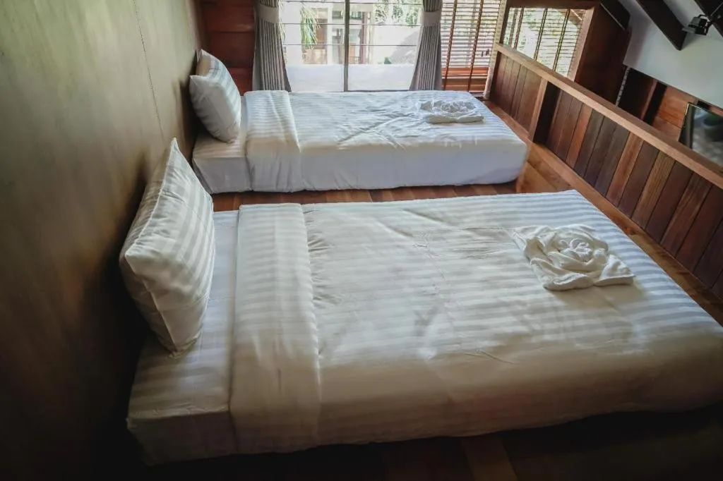 Bed in Khanom Cabana Beach Resort