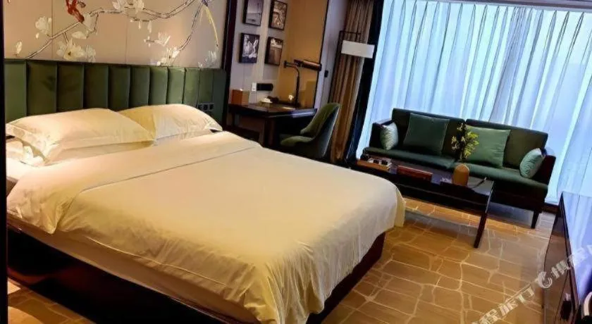 Bed in Metropolo Hotel Chengdu Wuhou Wanda Plaza