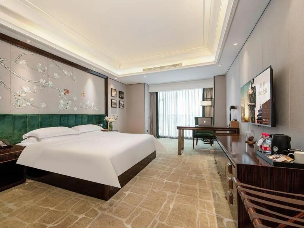 Bed in Metropolo Hotel Chengdu Wuhou Wanda Plaza