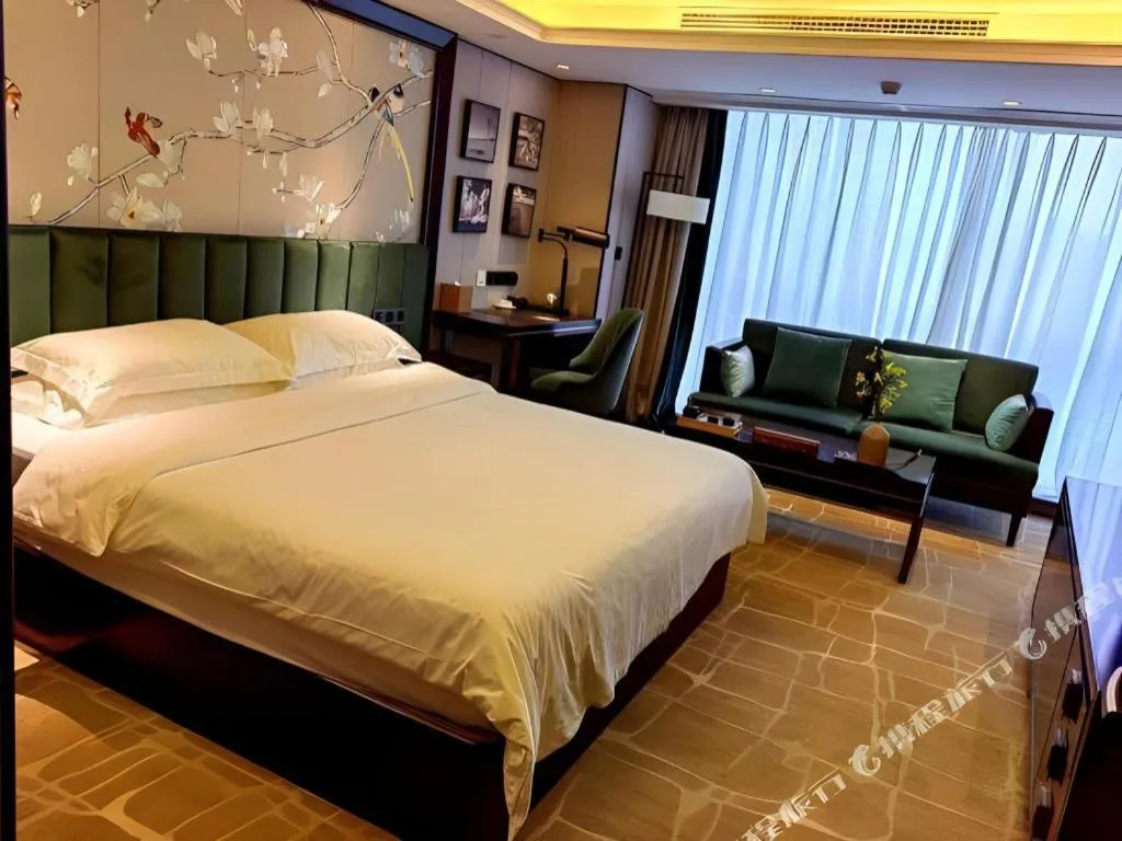 Bed in Metropolo Hotel Chengdu Wuhou Wanda Plaza