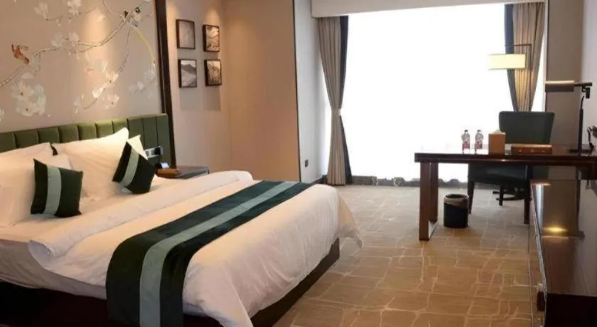 Bed in Metropolo Hotel Chengdu Wuhou Wanda Plaza