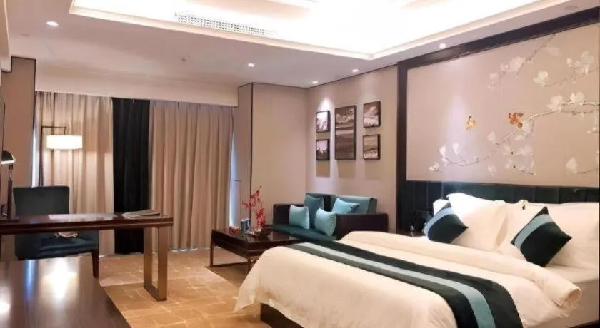 Bed in Metropolo Hotel Chengdu Wuhou Wanda Plaza