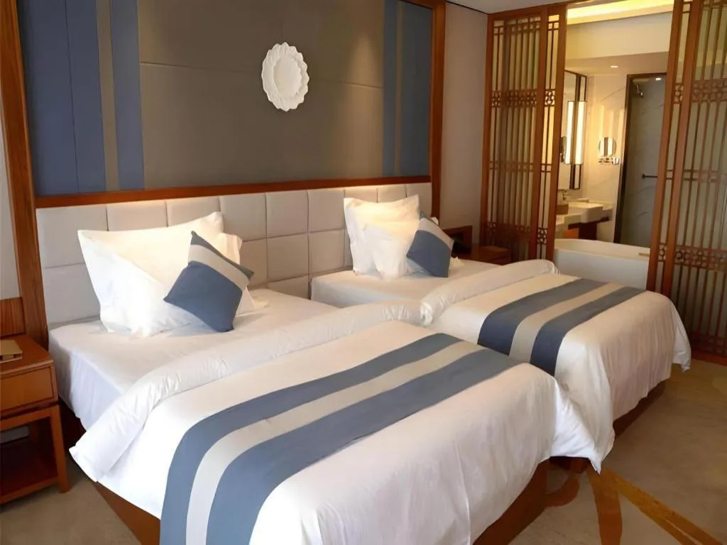 Bed in Metropolo Hotel Chengdu Wuhou Wanda Plaza